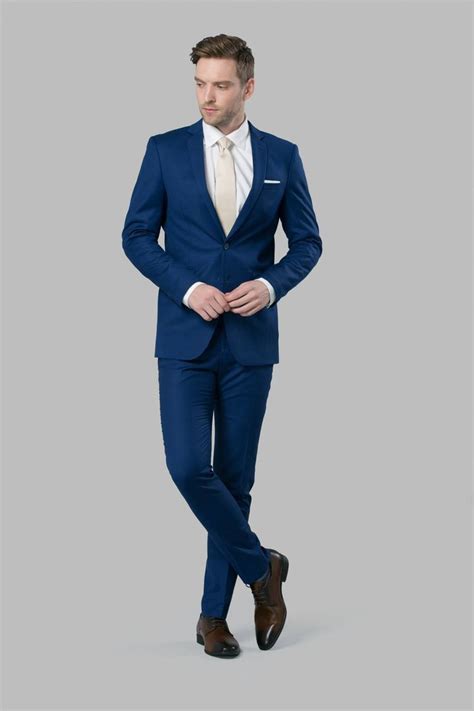 champagne tie navy suit.